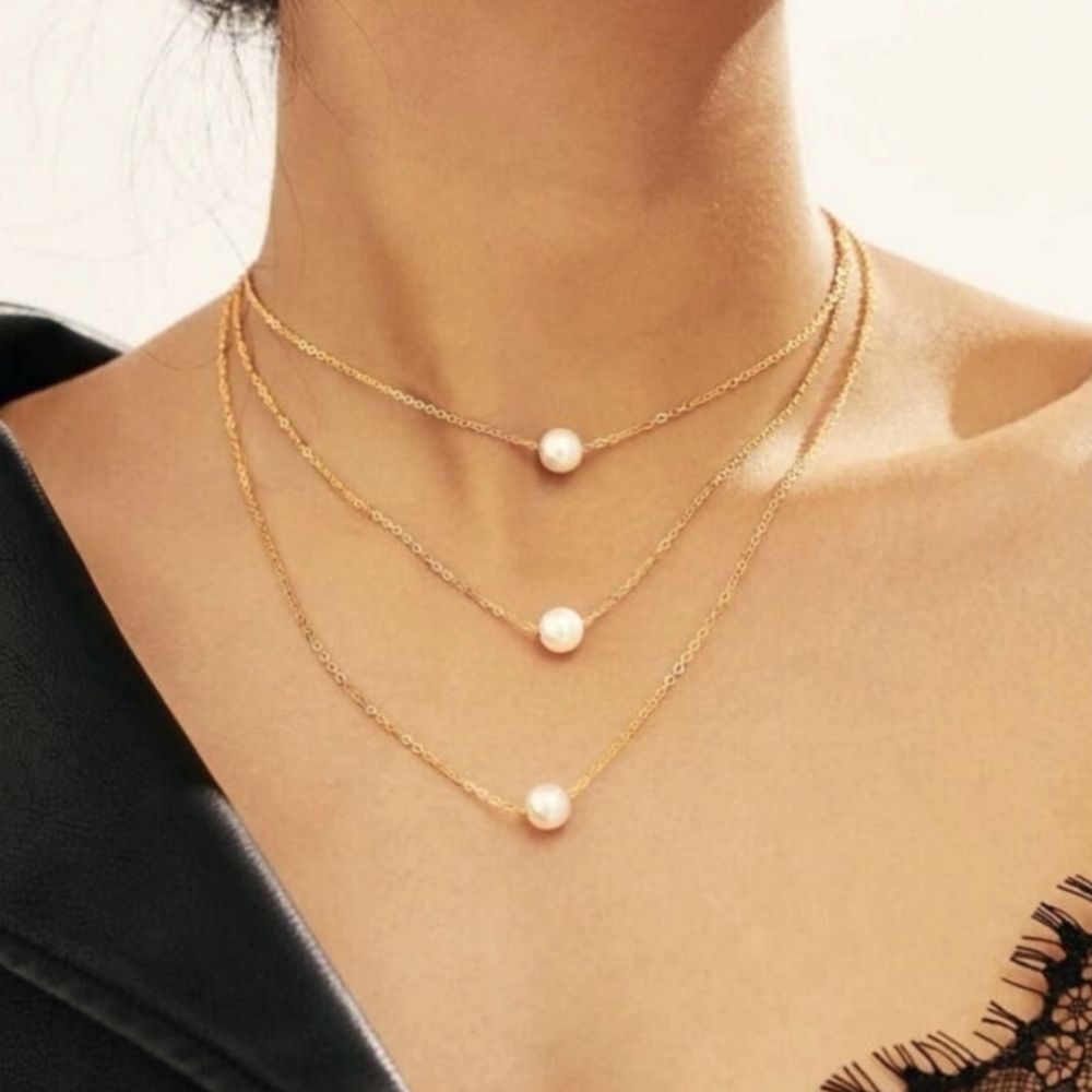 Gold tri layered pearl necklace